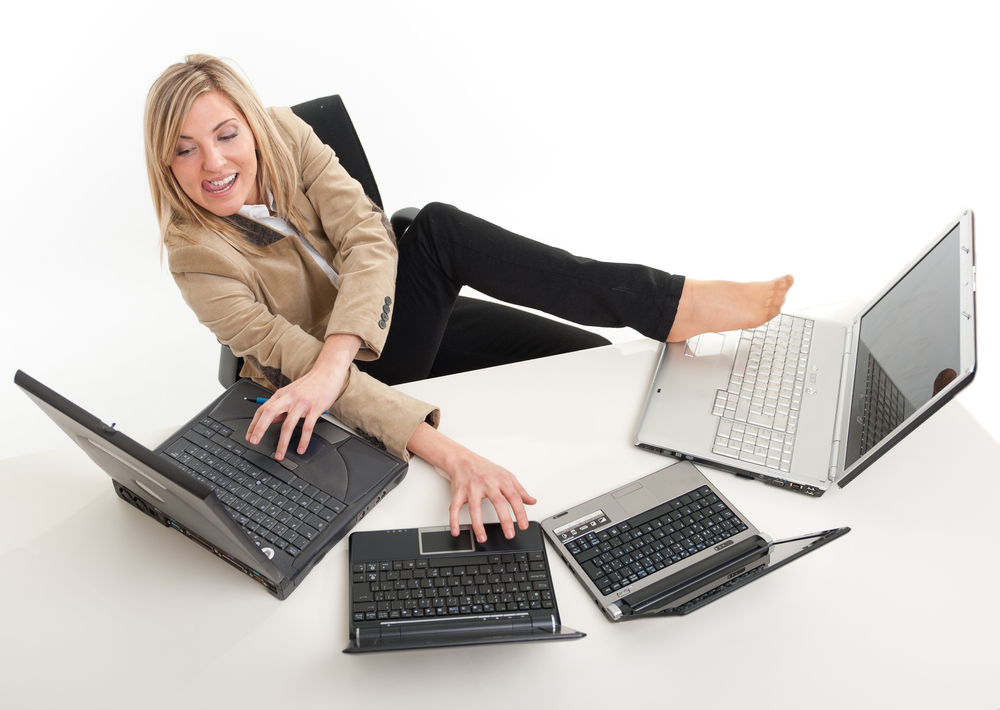 lady on multiple computers